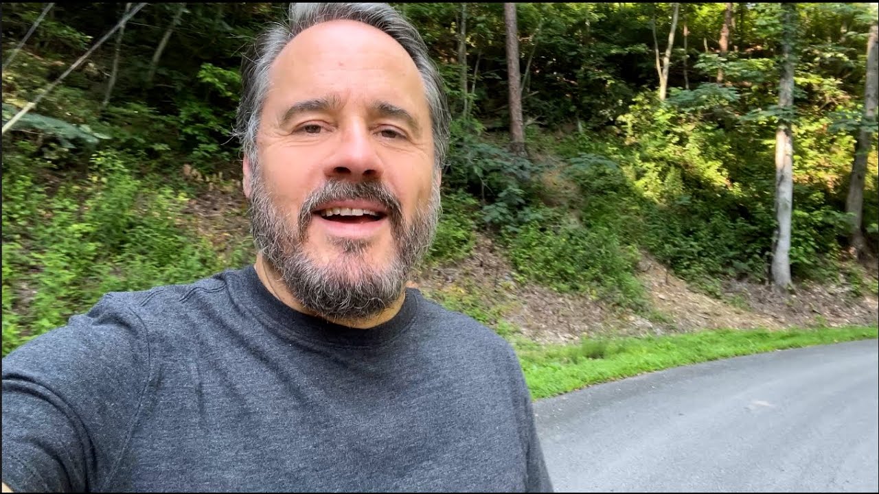 Man outdoors giving music career advice